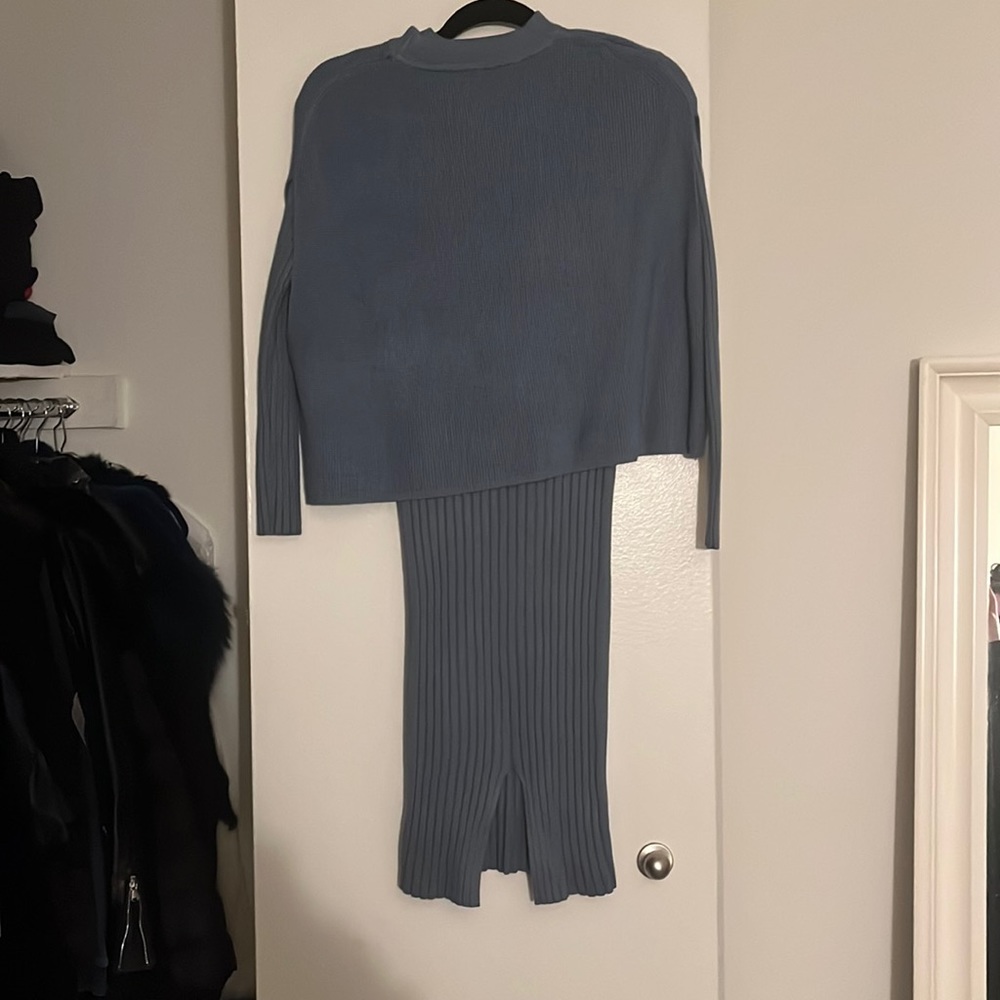 Light blue sweater dress. New. no tags